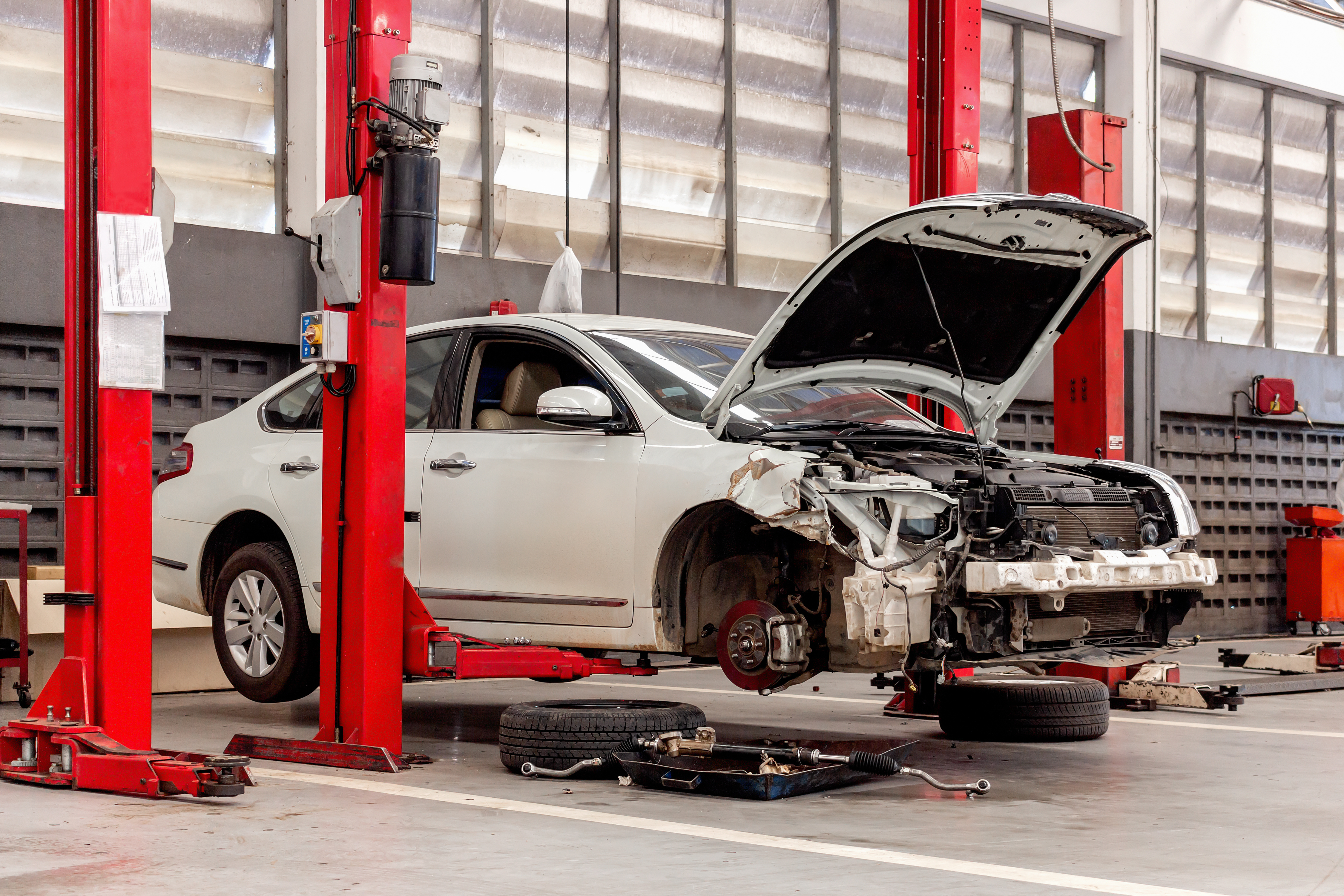 closeup car in repair station and body shop with soft-focus and